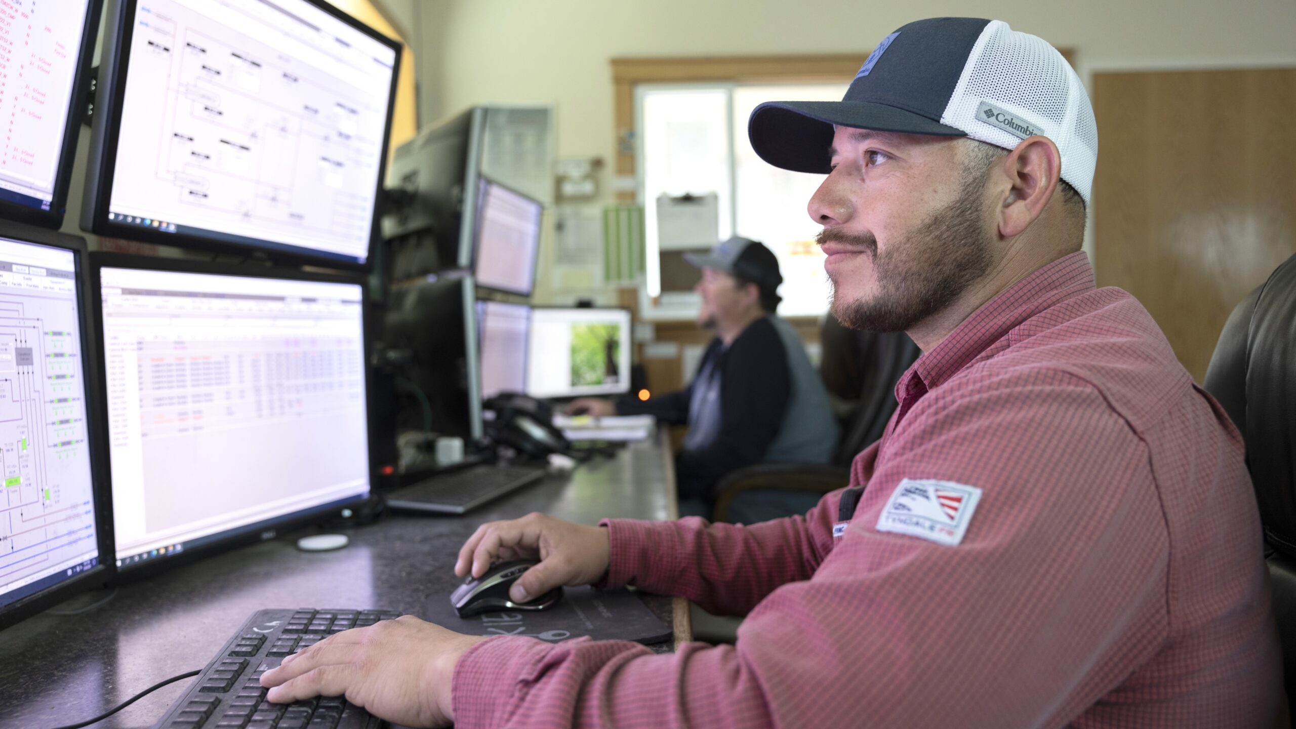 A veteran working on a computer.